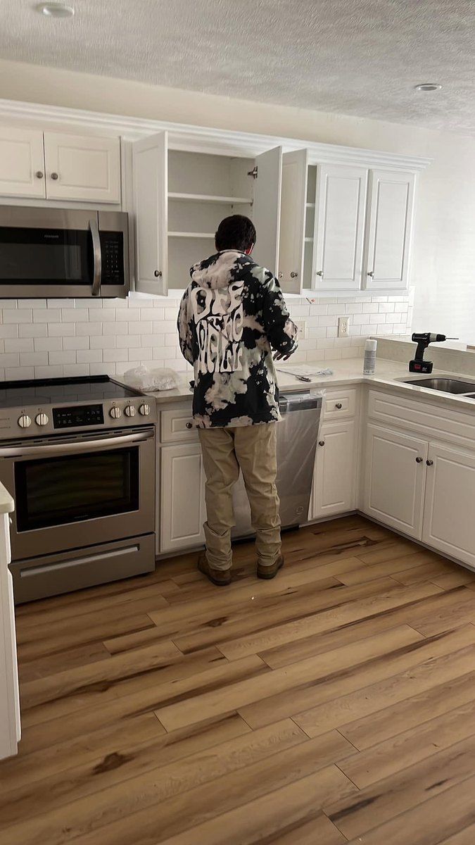 Kitchen after the rebuild: new custom cabinets